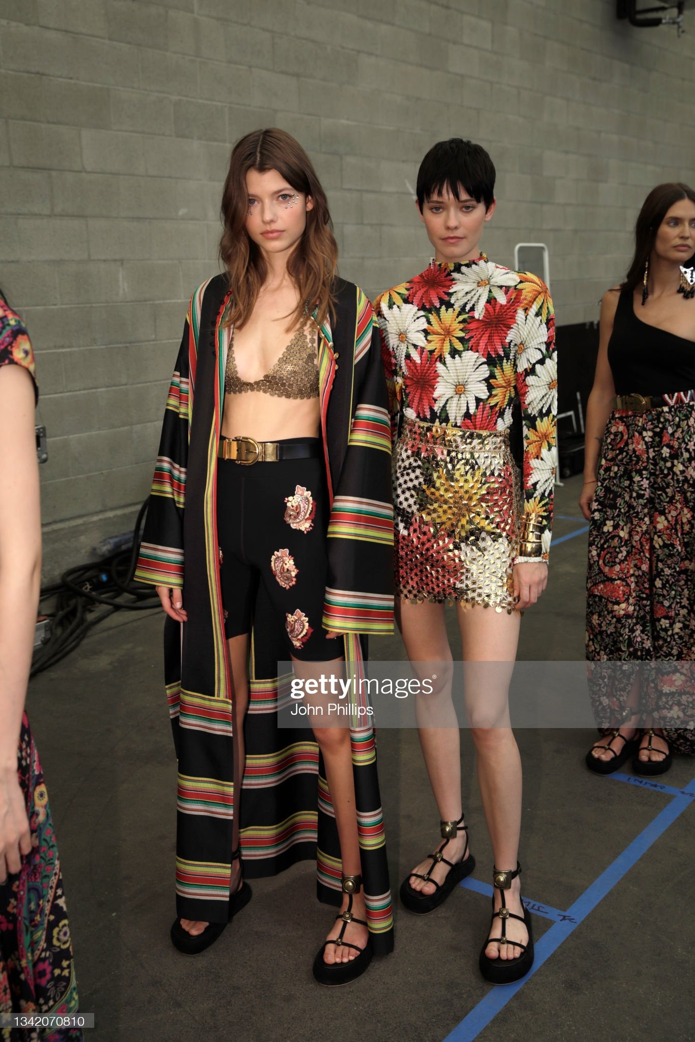models-pose-in-the-backstage-of-the-etro-fashion-show-during-the-picture-id1342070810